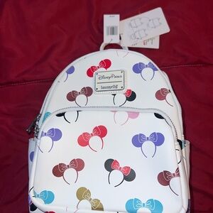 Loungefly Disney Parks White Backpack with Colorful Bow Design